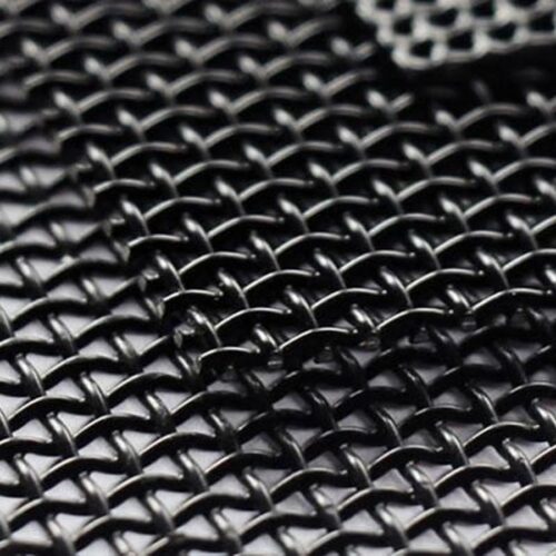 Macro close-up of black 316 stainless steel woven security mesh showing 0.8mm wires crossing over and under with 1.55mm square apertures